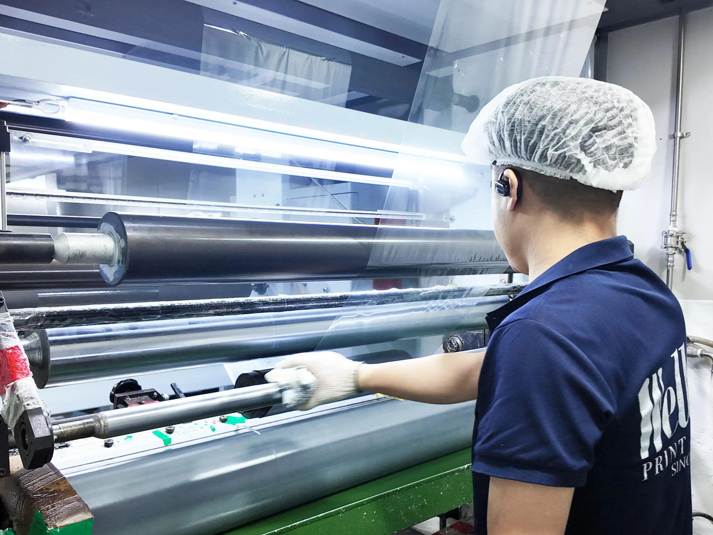 Laminating machine for multi-layer flexible packaging film
